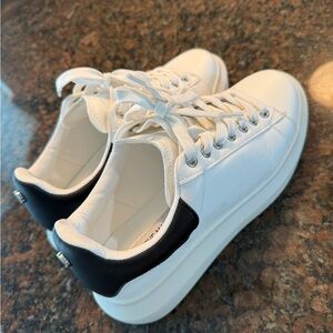 Steve Madden White and Black Sneakers with Minimalist Design